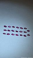 All rubies arranged in rows on light background