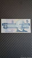 Obverse of 1986 Canadian $5 bill showing Sir Wilfrid Laurier
