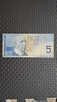 Obverse of 2002 Canadian $5 note showing Sir Wilfrid Laurier and denomination