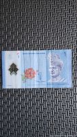 Obverse of Malaysian 1 ringgit polymer note showing portrait and security window