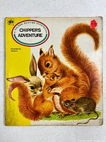 Front cover showing title, illustration of squirrel family, publisher logo