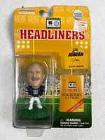 Front view of sealed Kevin Greene Headliners figure on card