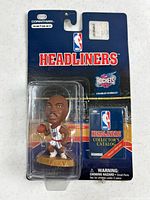 Front view of sealed Corinthian NBA Headliners Charles Barkley figure and catalog in blister packaging