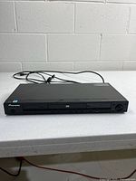 Front view of Pioneer DV-410V showing disc tray, USB port and controls