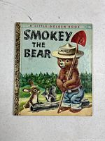 Front cover showing title, illustration, and gold spine