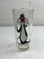 Front view of glass showing Sylvester graphic