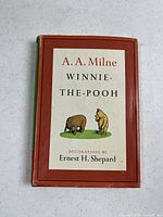 Front of dust-jacketed book showing title, author, illustrator and central illustration