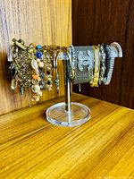 Full group of bracelets on display stand