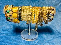 Full group of bracelets on display stand, side view