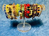 Full view of bracelet assortment on acrylic stand