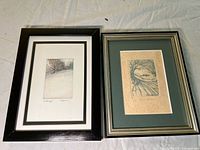 Both framed L Johnson prints side by side