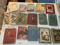 Group shot of approximately 16 bagged and loose vintage children’s books showing variety of titles and condition