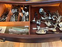 Drawer view of entire mixed flatware assortment