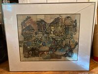 Full view of framed collage showing cracked glass