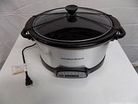 Front view of Hamilton Beach stainless slow cooker with lid attached