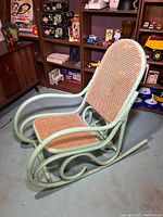 Left side perspective view of rocking chair showing overall form and colour
