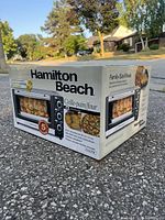 Sealed Hamilton Beach toaster oven box side view with product image and model 31409C