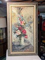 Full front view of framed painting