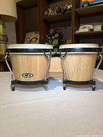Front view of bongos on table