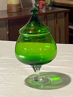 Full view of green glass lidded candy dish