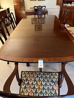 Top view of dining table with high gloss finish and leaf inserted