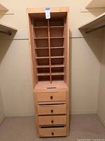 Full frontal view of organizer showing cubbies and drawers