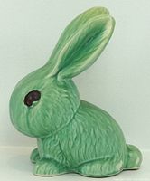 Left side view of green Sylvac ceramic bunny figurine