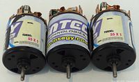 Front view showing three Integy 55T motors with labels and shafts