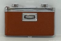 Front closed view showing brown leatherette and focus wheel