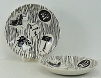 Two Homemaker pattern saucers front view, showing full design