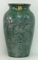 Front view relief dragon matte green Medalta vase