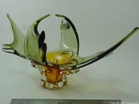 Full view of sculptural 12-point green and amber art glass centerpiece