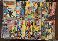 All 25 Action Comics laid out showing covers