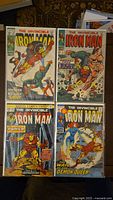All four Iron Man comics laid out