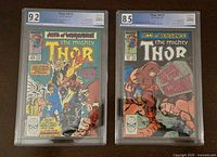 Front view of Thor #411 and #412 PGX slabs showing grades 8.5 and 9.2