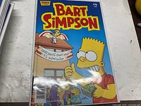 Front cover of Bart Simpson #76 comic book in protective sleeve