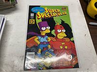 Front view of Simpsons Super Spectacular #10 comic in plastic sleeve
