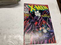 Front cover of The Uncanny X-Men #239 comic