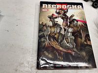 Front cover showing title, Marvel logo, character art, authors listed