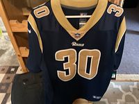 Front view showing number 30, NFL shield, team colors