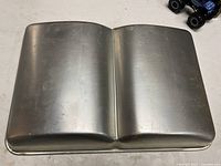 Top view of aluminum open book cake pan