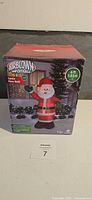 Front of box showing Airblown Inflatable 6 ft Santa decoration