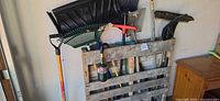 All yard tools grouped against pallet