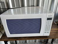 Front view showing Panasonic branding, keypad and overall condition