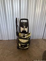 Front view of Sun Joe pressure washer with hose wrapped around body