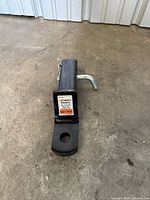 Top view of drawbar showing sticker and ball hole