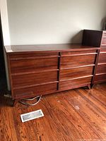 Front view of six-drawer mahogany dresser