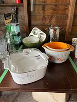 Group shot showing all listed kitchen items on table