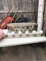 Pendant and vanity bar on table, full view