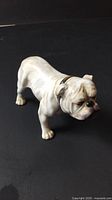Left side view of porcelain bulldog figurine